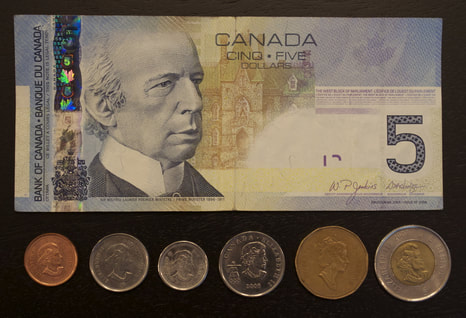 Canada dollar currency bill coins